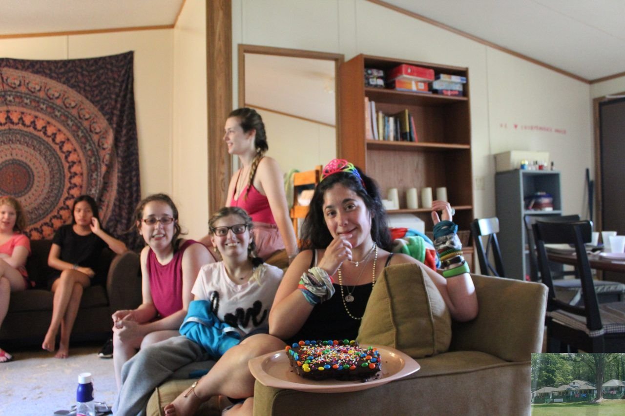 Summit participants spending time together in a shared living space.