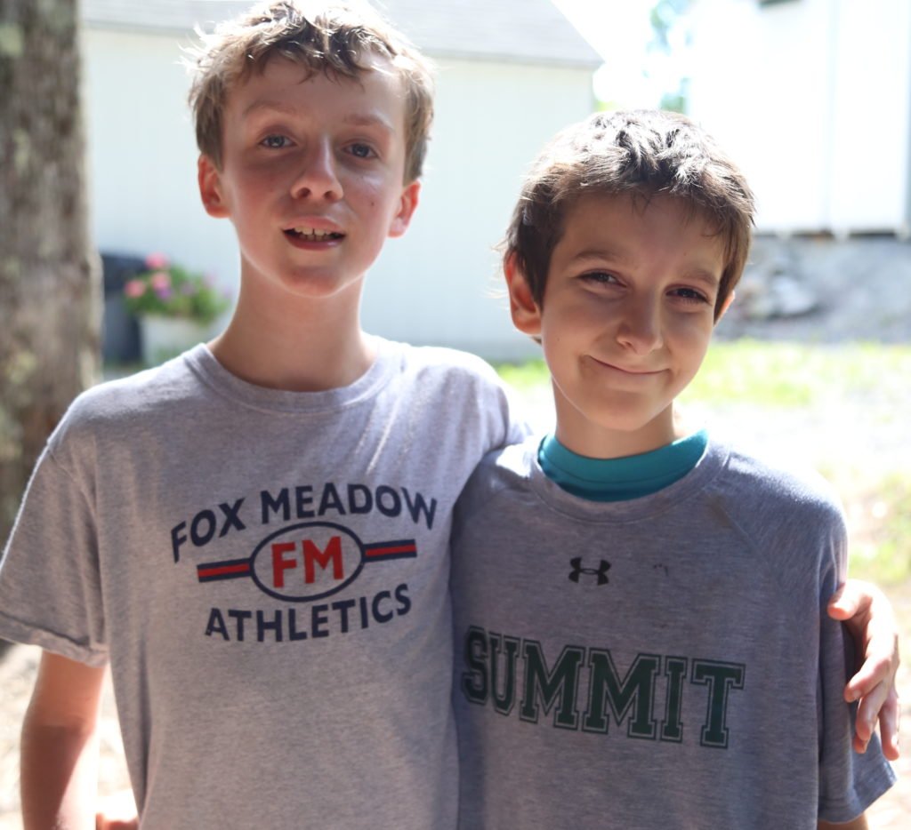 Families and staff connect at a Summit open house.
