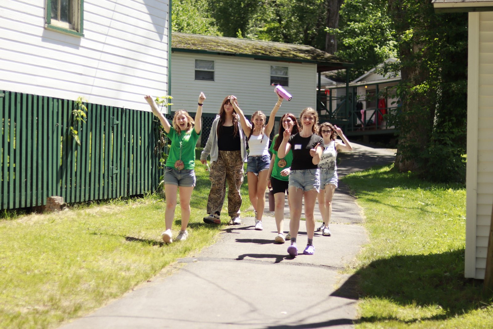 Summit campers celebrating together on campus.