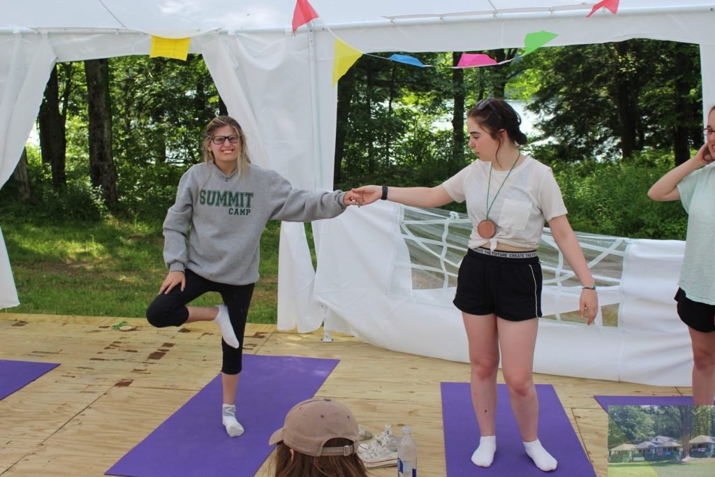 A participant practices a calming activity at Summit.
